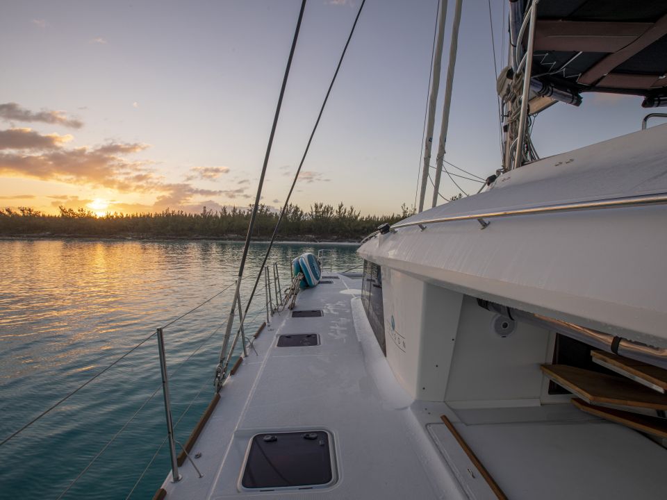 Catamaran side deck at sunset